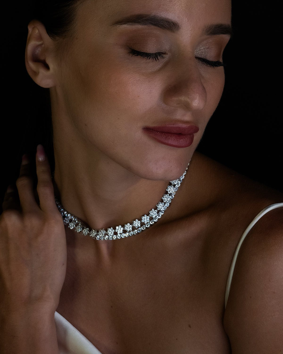 Godfrey Allure's Brigitte Fleur floral design rivière necklace. Refined silver and Allyure precision-cut stones with diamond like fire