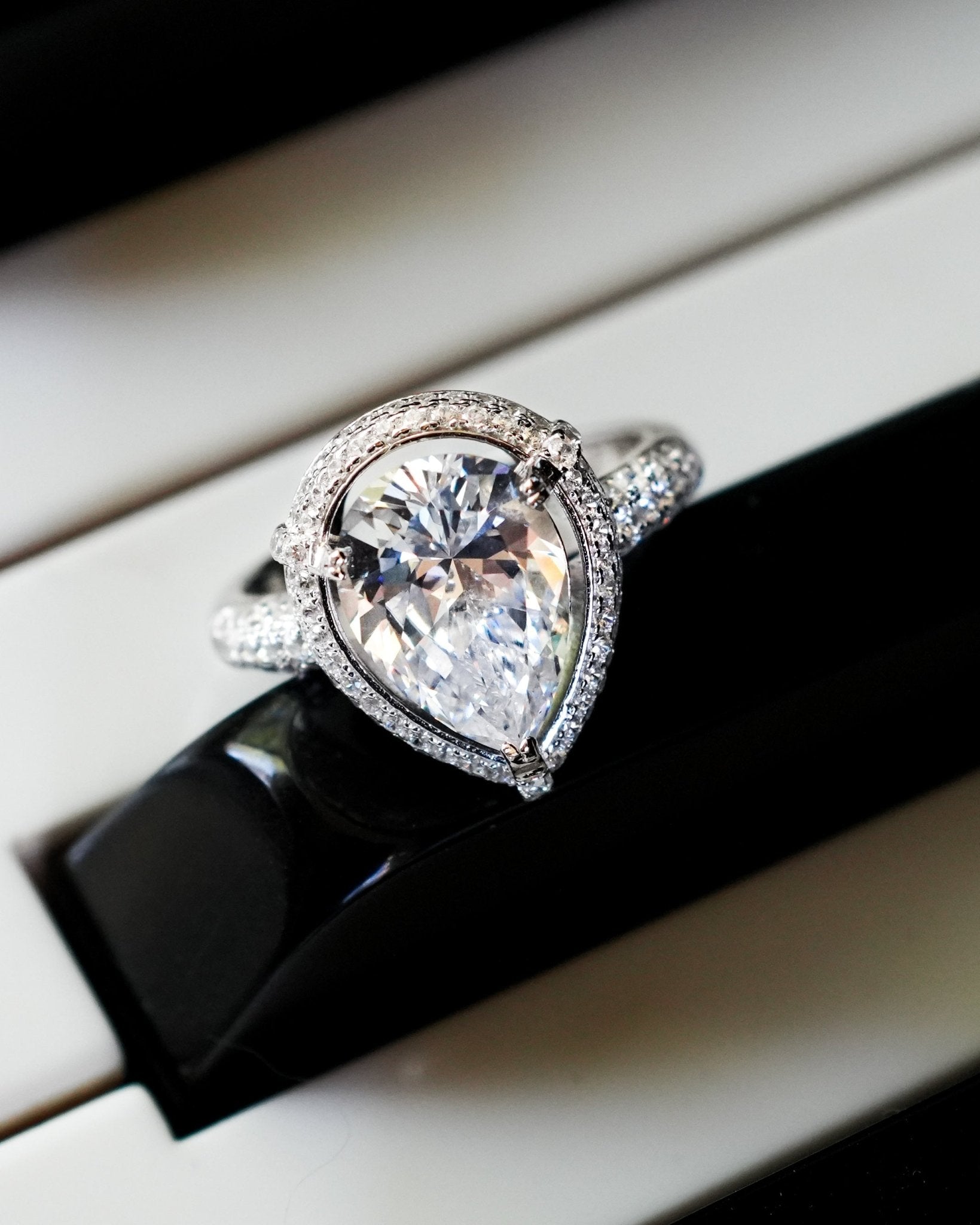 Kelly Pear-Cut Sterling Silver Ring with CZ Stones – Godfrey Allure Jewelry