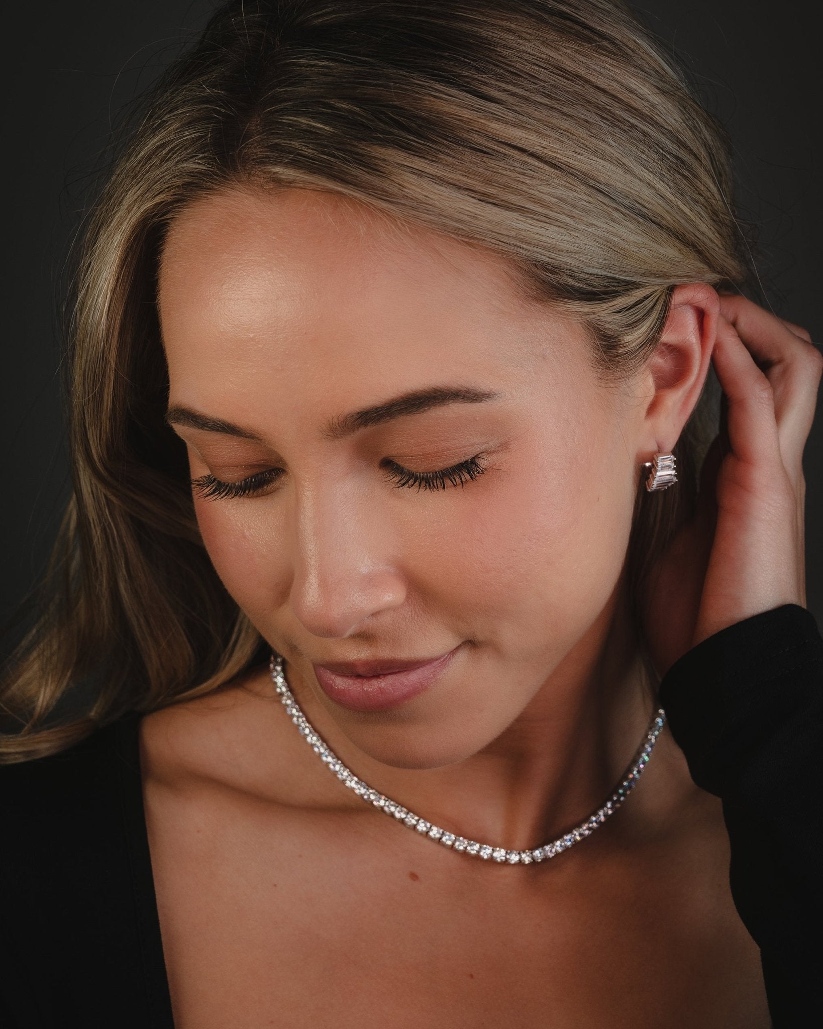 Franca, Graduated Baguette-Cut Simulated Diamond Huggie Earrings in Sterling Silver