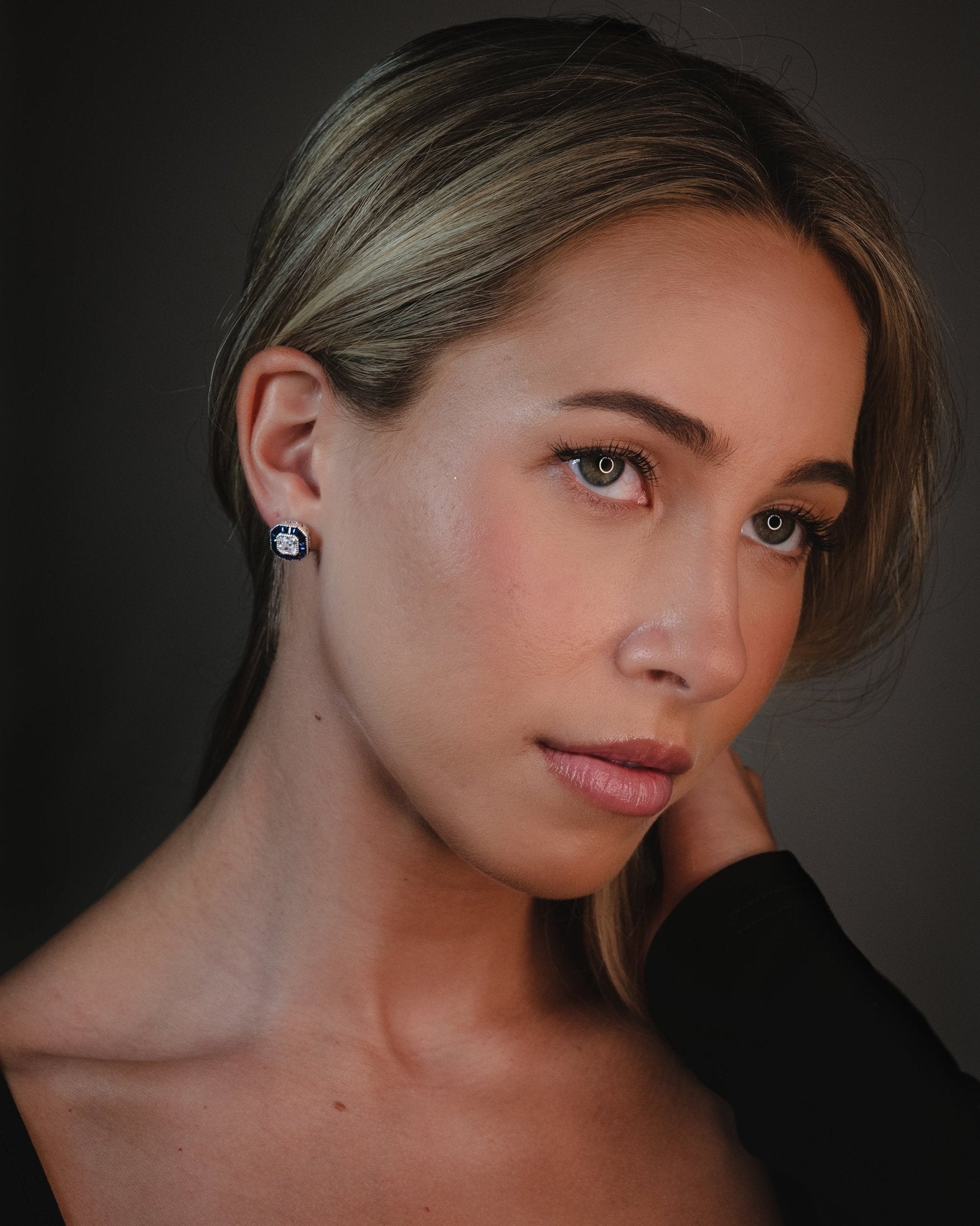 Gilda Earrings with Asscher cut center stone and blue baguette simulated sapphires set in sterling silver