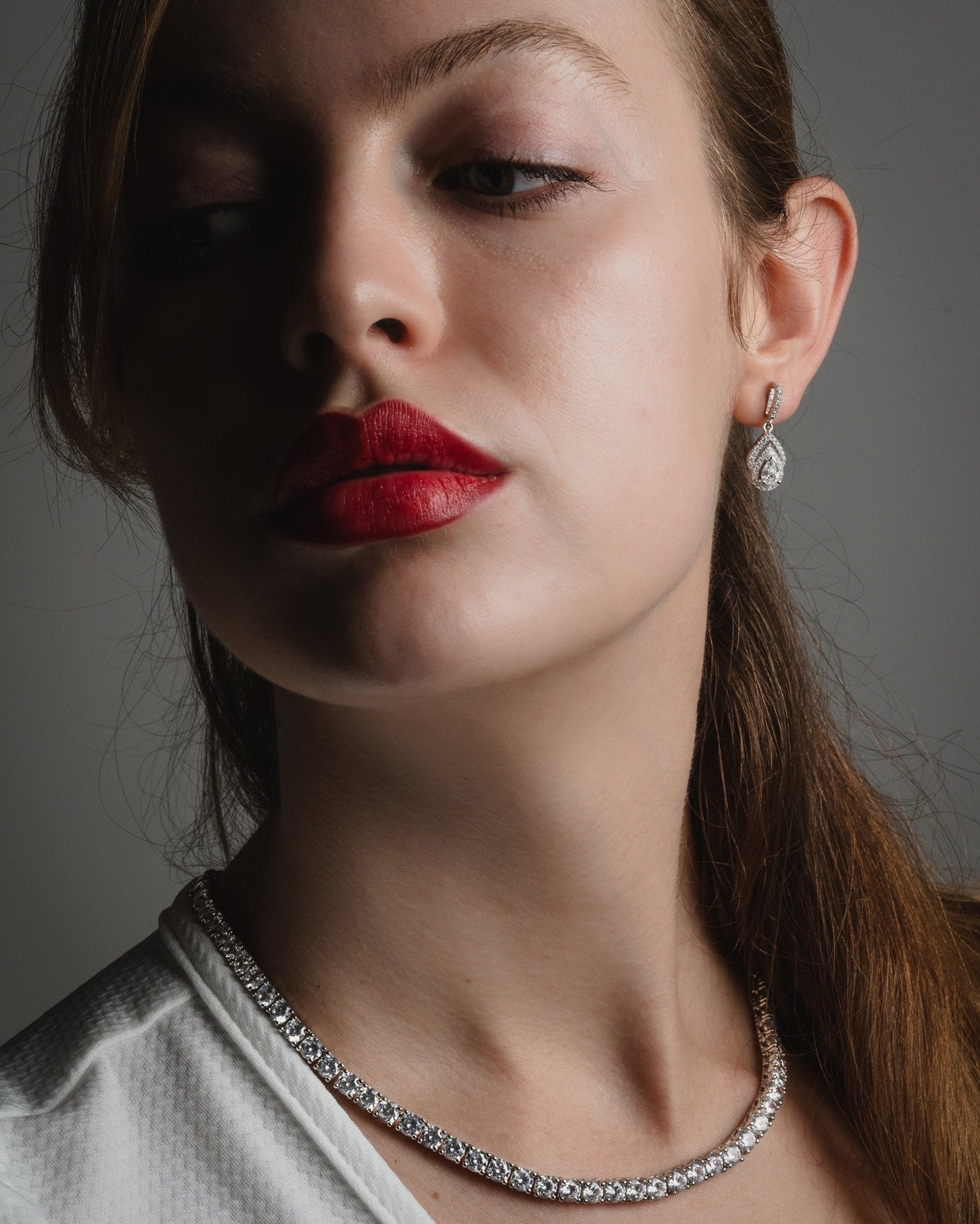 Ida, Sterling Silver Drop Earrings with Pear-Shaped Simulated Diamond and Pavé Accents