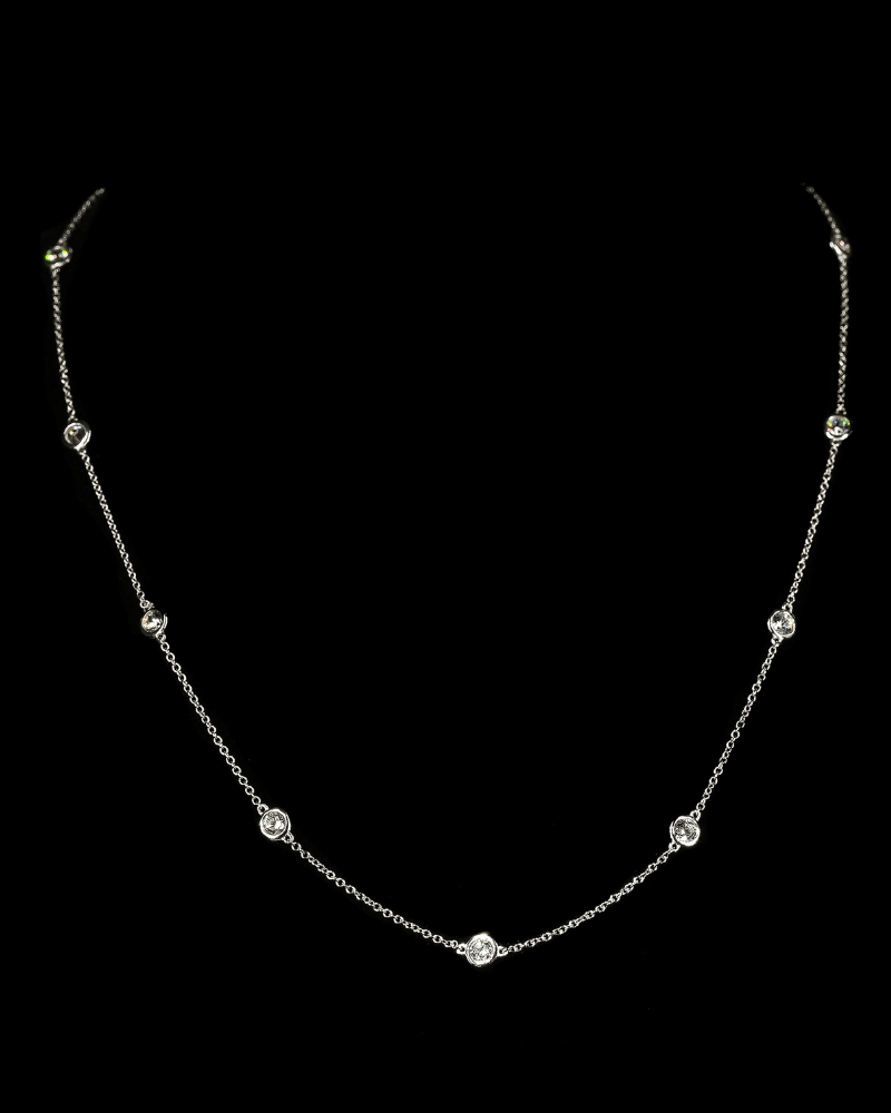 Isa Necklace with 11 bezel-set round simulated diamonds on a delicate sterling silver chain