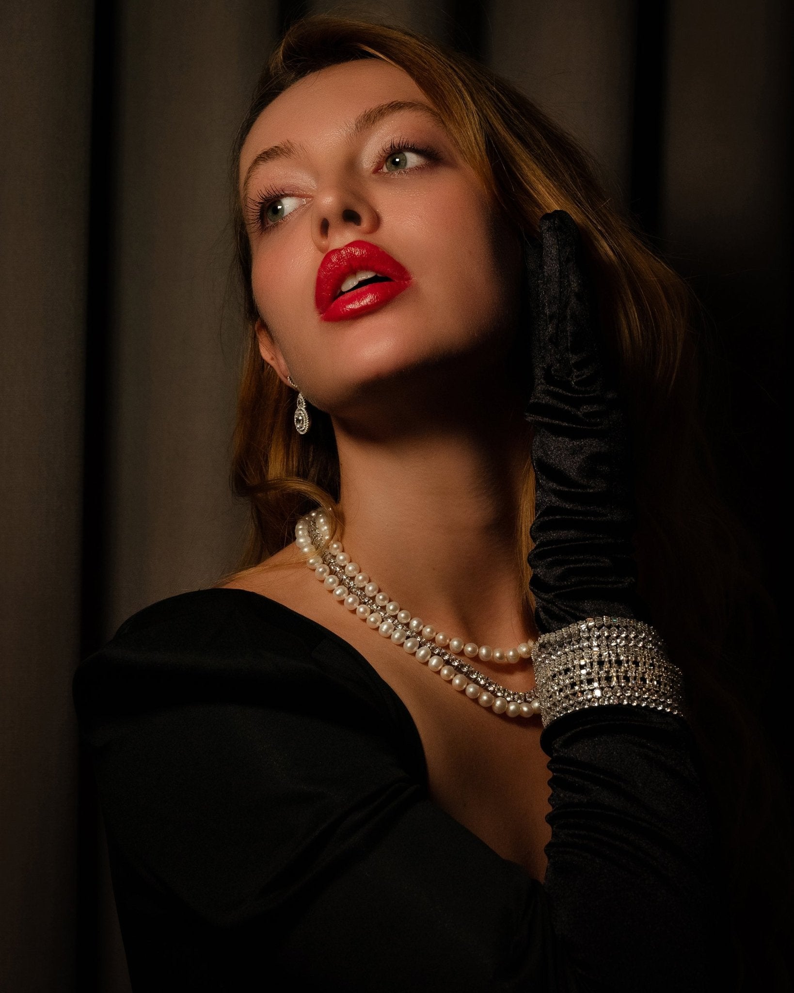 Maude Necklace featuring graduated 7–8 mm white freshwater pearls with sterling silver fish hook clasp