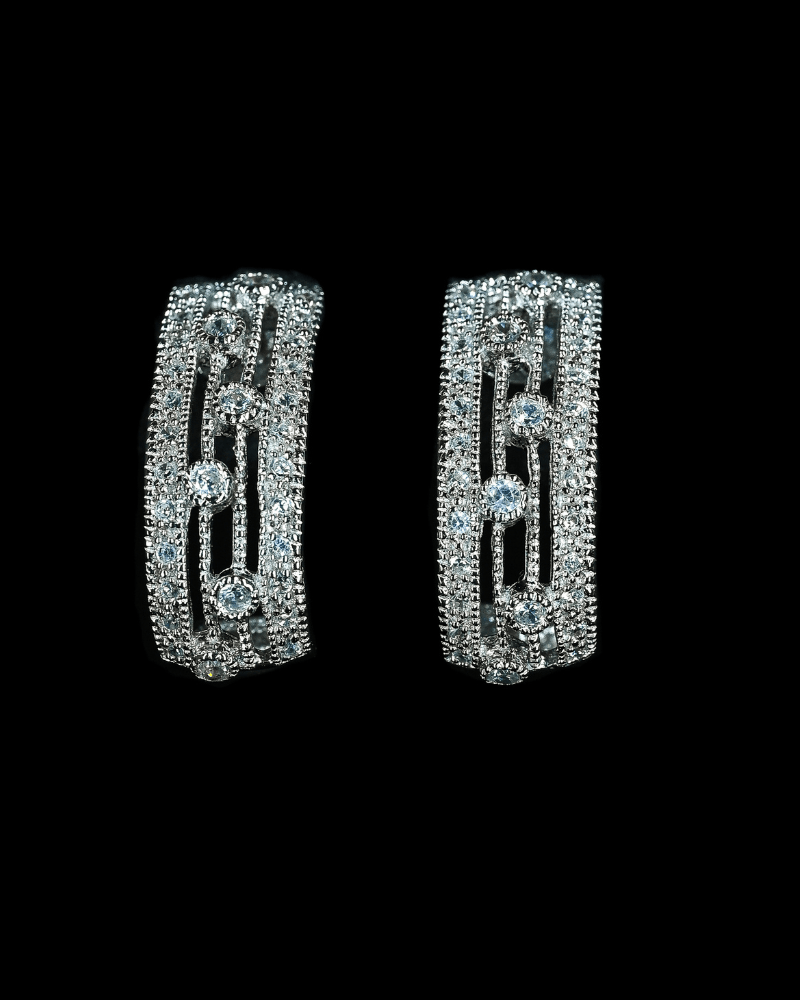 Claudette Earrings with round cut simulated diamonds and pavé accents set in sterling silver with post closure