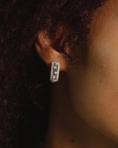 Claudette Earrings with round cut simulated diamonds and pavé accents set in sterling silver with post closure