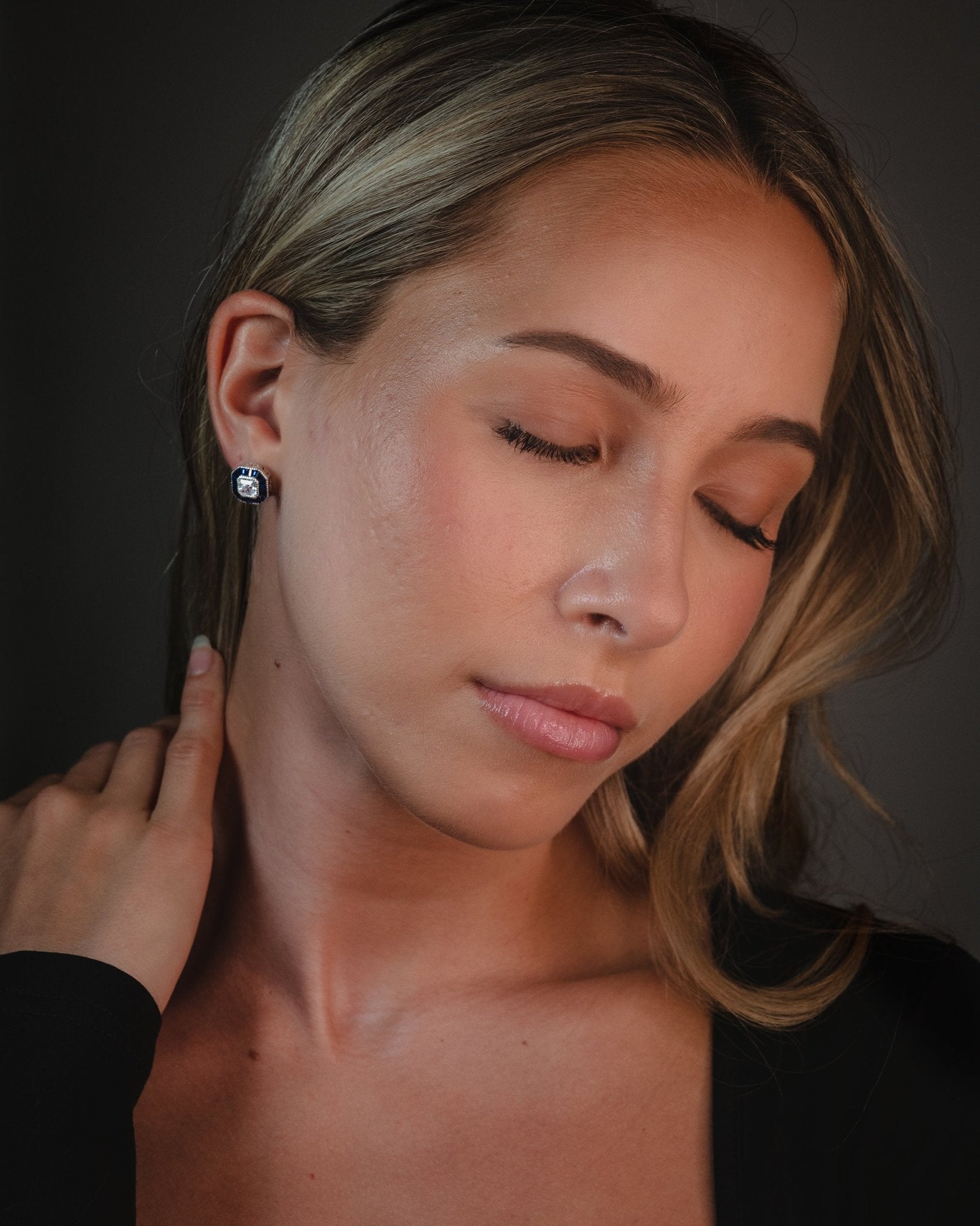 Gilda Earrings with Asscher cut center stone and blue baguette simulated sapphires set in sterling silver