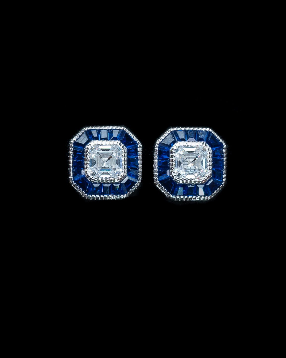 Gilda Earrings with Asscher cut center stone and blue baguette simulated sapphires set in sterling silver